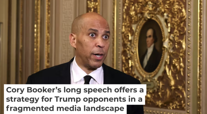 Sen. Cory Booker speaks to reporters in the Senate Chamber after delivering a record-setting floor speech at the U.S. Capitol on April 1, 2025. Tasos Katopodis/Getty Images`